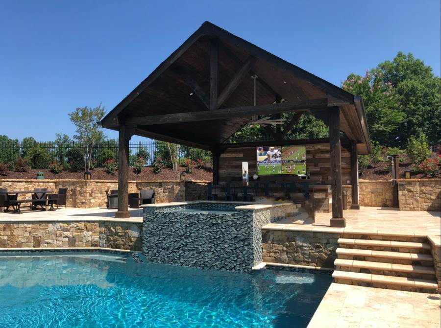 Poolside Pavilion With A Covered Seating Area