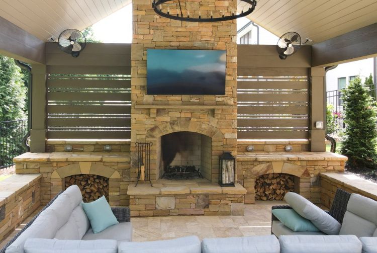 Stone Fireplace In Covered Patio In Woodstock, GA